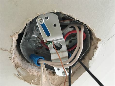 how are ceiling electrical boxes attached|installing a ceiling junction box.